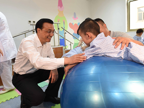 這三年，總理牽掛的殘疾人群體，迎來哪些暖政？