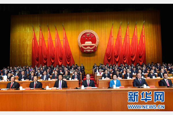 10月1日，慶祝中華人民共和國成立66周年暨新疆維吾爾自治區(qū)成立60周年大會在新疆人民會堂隆重舉行。 新華社記者 饒愛民 攝