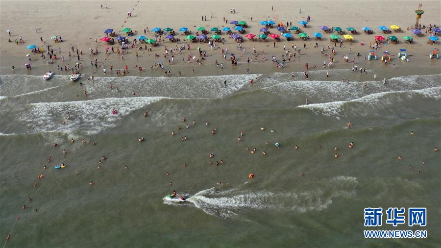 （壯麗70年 奮斗新時代&mdash;&mdash;推動高質(zhì)量發(fā)展調(diào)研行&middot;圖文互動）（3）近海能看鯨魚白海豚，廣西這片濱海旅游勝地啥來頭？