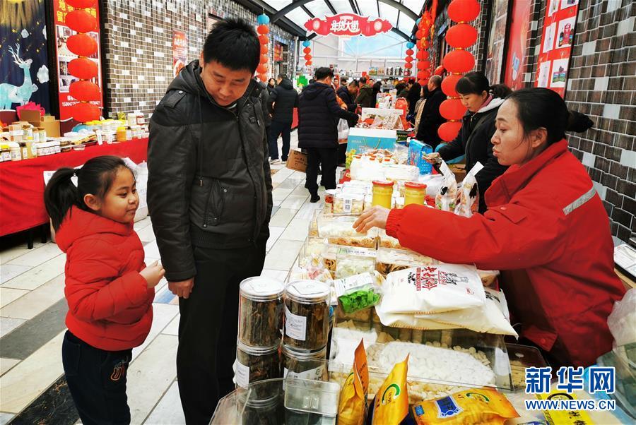 (新春走基層·圖文互動(dòng))(1)“貨郎干部”扶貧記