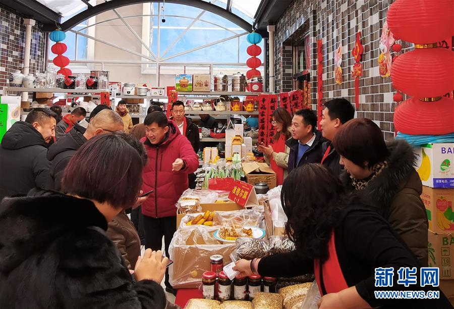 (新春走基層·圖文互動(dòng))(2)“貨郎干部”扶貧記