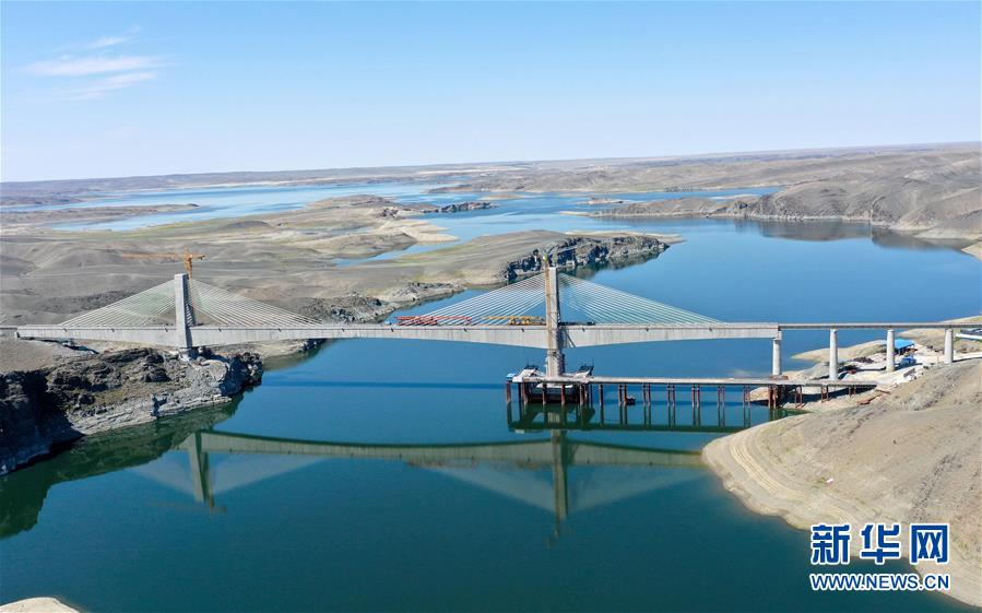 (經(jīng)濟(jì))(1)阿富準(zhǔn)鐵路鋪軌全線貫通 北疆鐵路環(huán)線正式形成