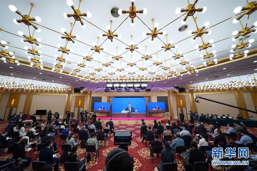 (兩會(huì)·XHDW)(20)國務(wù)委員兼外交部長王毅回答中外記者提問