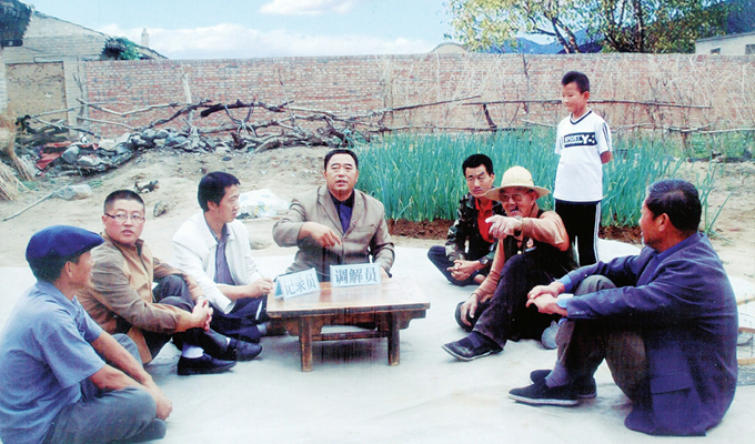 調(diào)解&ldquo;家長(zhǎng)里短，雞毛蒜皮&rdquo;的小事情是李培斌從事的大事業(yè)