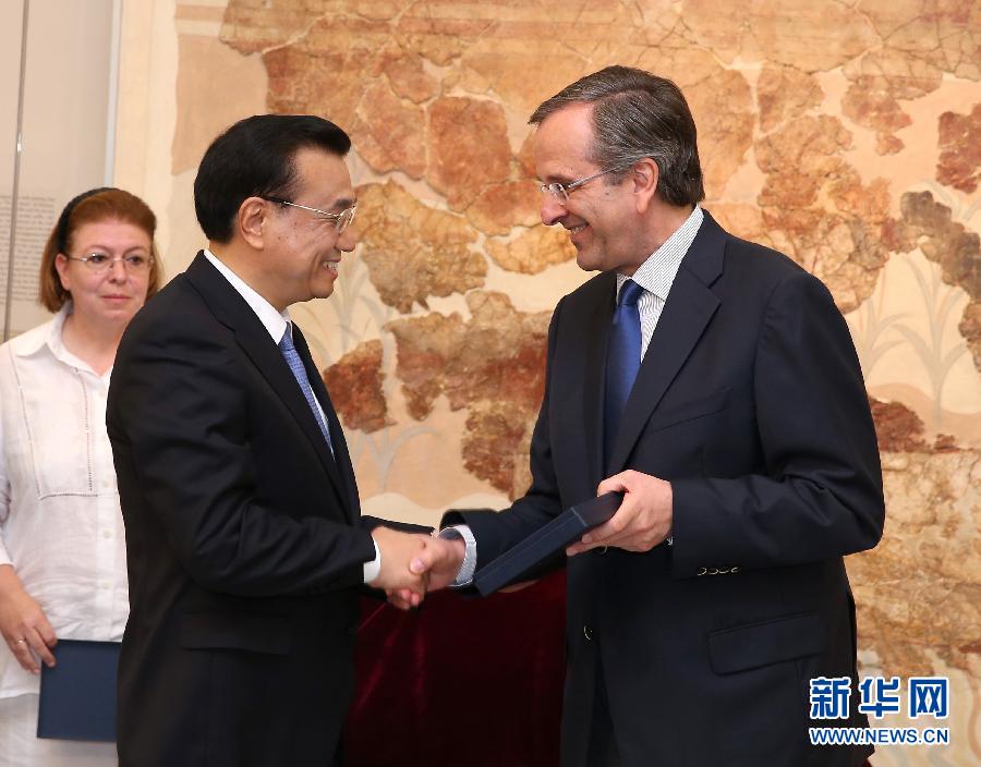 6月21日，國(guó)務(wù)院總理李克強(qiáng)與希臘總理薩馬拉斯共同出席希臘伊拉克利翁博物館新館開(kāi)館儀式并發(fā)表講話。 新華社記者 龐興雷 攝