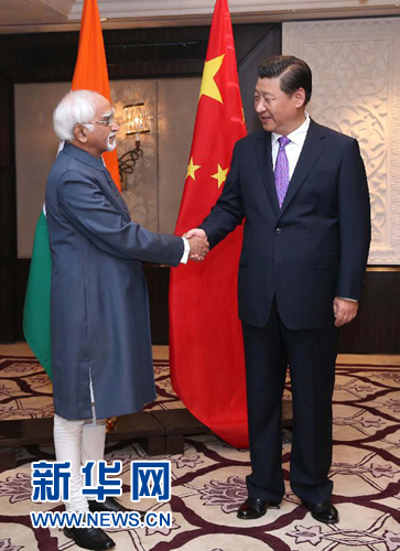 9月18日，國家主席習(xí)近平在新德里會見印度副總統(tǒng)兼聯(lián)邦院議長安薩里。 新華社記者 龐興雷 攝