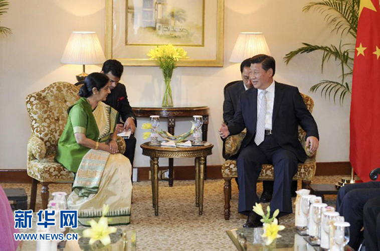 9月18日，國家主席習(xí)近平在新德里會見印度外長斯瓦拉杰。新華社記者 張鐸 攝