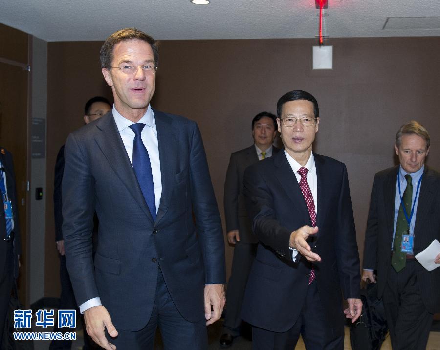 9月23日，出席聯(lián)合國氣候峰會的國家主席習(xí)近平特使、國務(wù)院副總理張高麗在紐約聯(lián)合國總部會見荷蘭首相呂特。 新華社記者 王曄 攝 