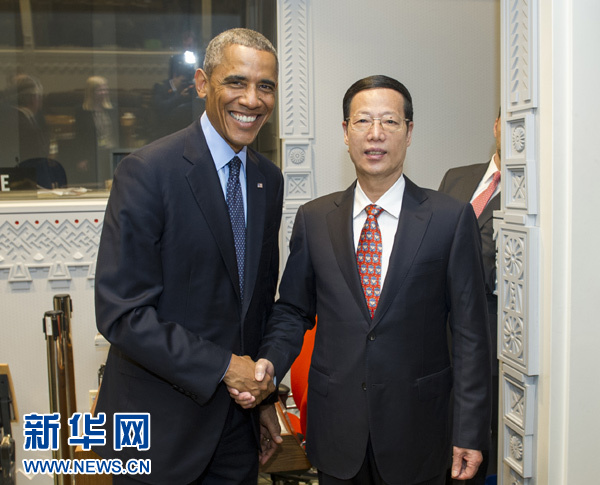 9月23日，國家主席習(xí)近平特使、國務(wù)院副總理張高麗在紐約會見出席聯(lián)合國氣候峰會的美國總統(tǒng)奧巴馬。 新華社記者王曄攝