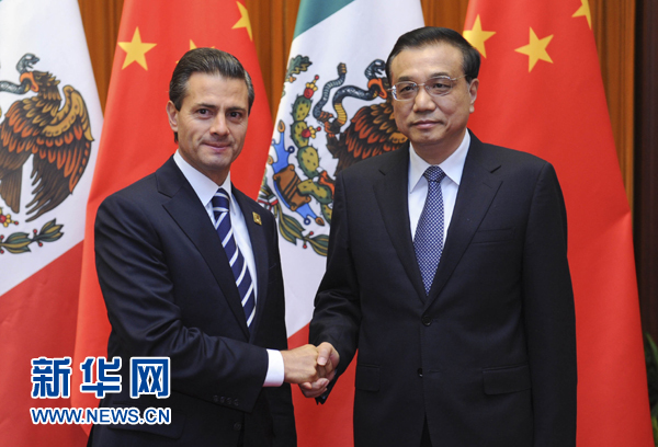 11月11日，國務院總理李克強在北京人民大會堂會見來華進行國事訪問并出席亞太經(jīng)合組織第二十二次領導人非正式會議的墨西哥總統(tǒng)培尼亞。新華社記者張鐸 攝 