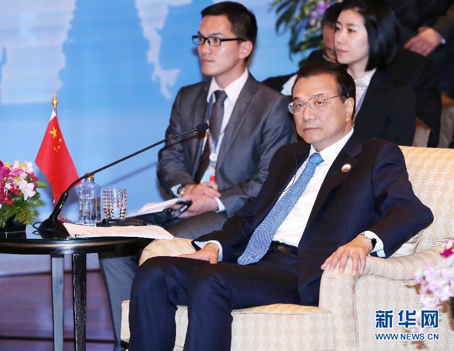 12月20日，中國國務(wù)院總理李克強(qiáng)在曼谷出席大湄公河次區(qū)域經(jīng)濟(jì)合作領(lǐng)導(dǎo)人第五次會議。 新華社記者 龐興雷 攝 