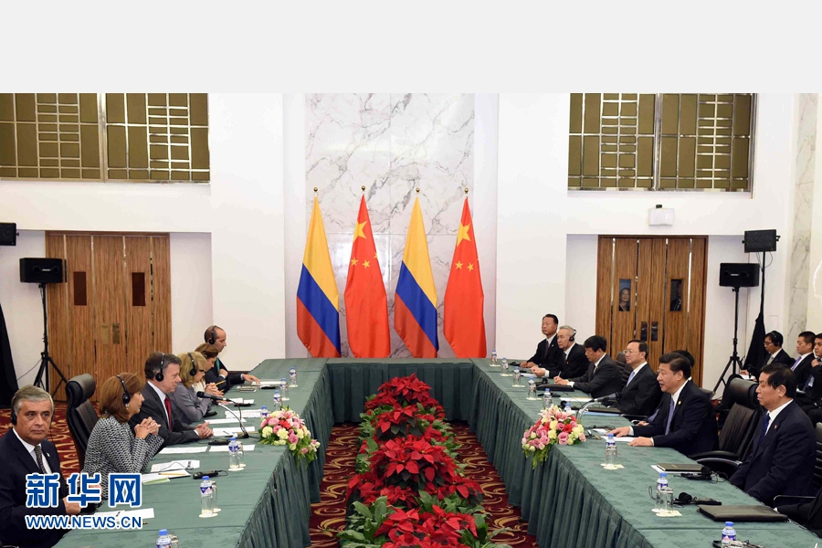 11月18日，國家主席習(xí)近平在菲律賓馬尼拉會見哥倫比亞總統(tǒng)桑托斯。 新華社記者 饒愛民 攝