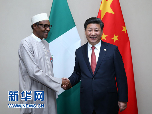 12月4日，國(guó)家主席習(xí)近平在約翰內(nèi)斯堡會(huì)見(jiàn)尼日利亞總統(tǒng)布哈里。 新華社記者 龐興雷 攝 