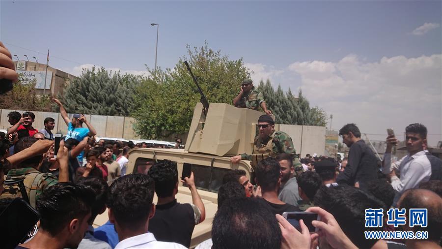 (國(guó)際)(2)伊拉克埃爾比勒省政府大樓遭武裝分子攻擊